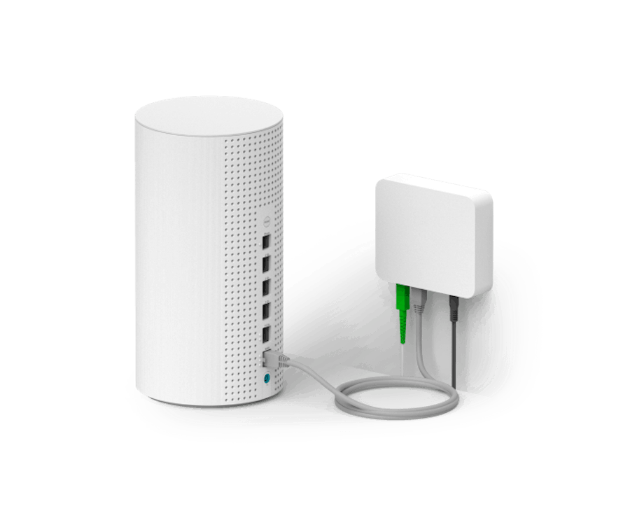 The new Sky Gigafast+ WiFi 7 hub connected to by wires to a box in a wall.